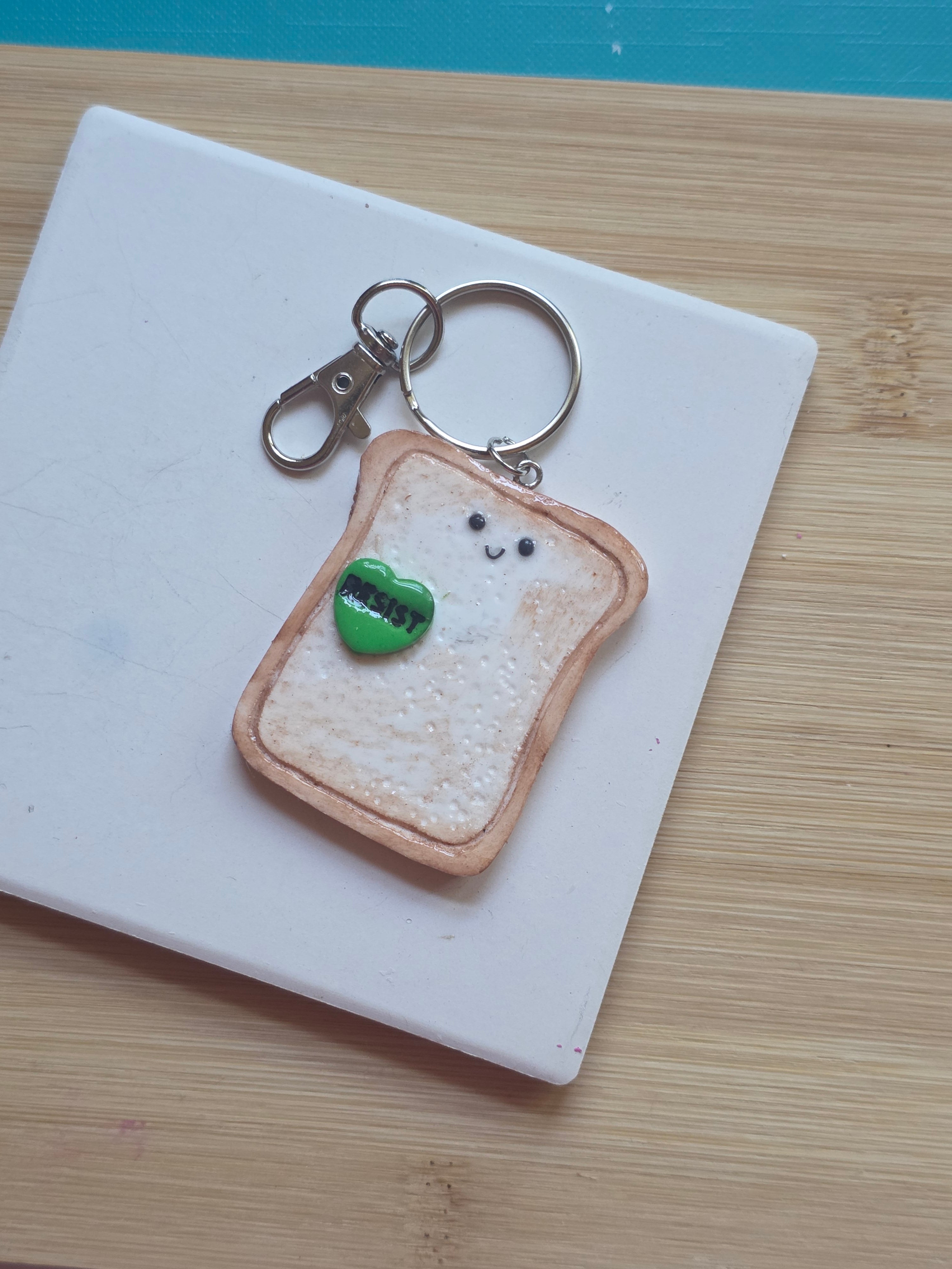 Resist! Emotional Support Toast Friend Keychain