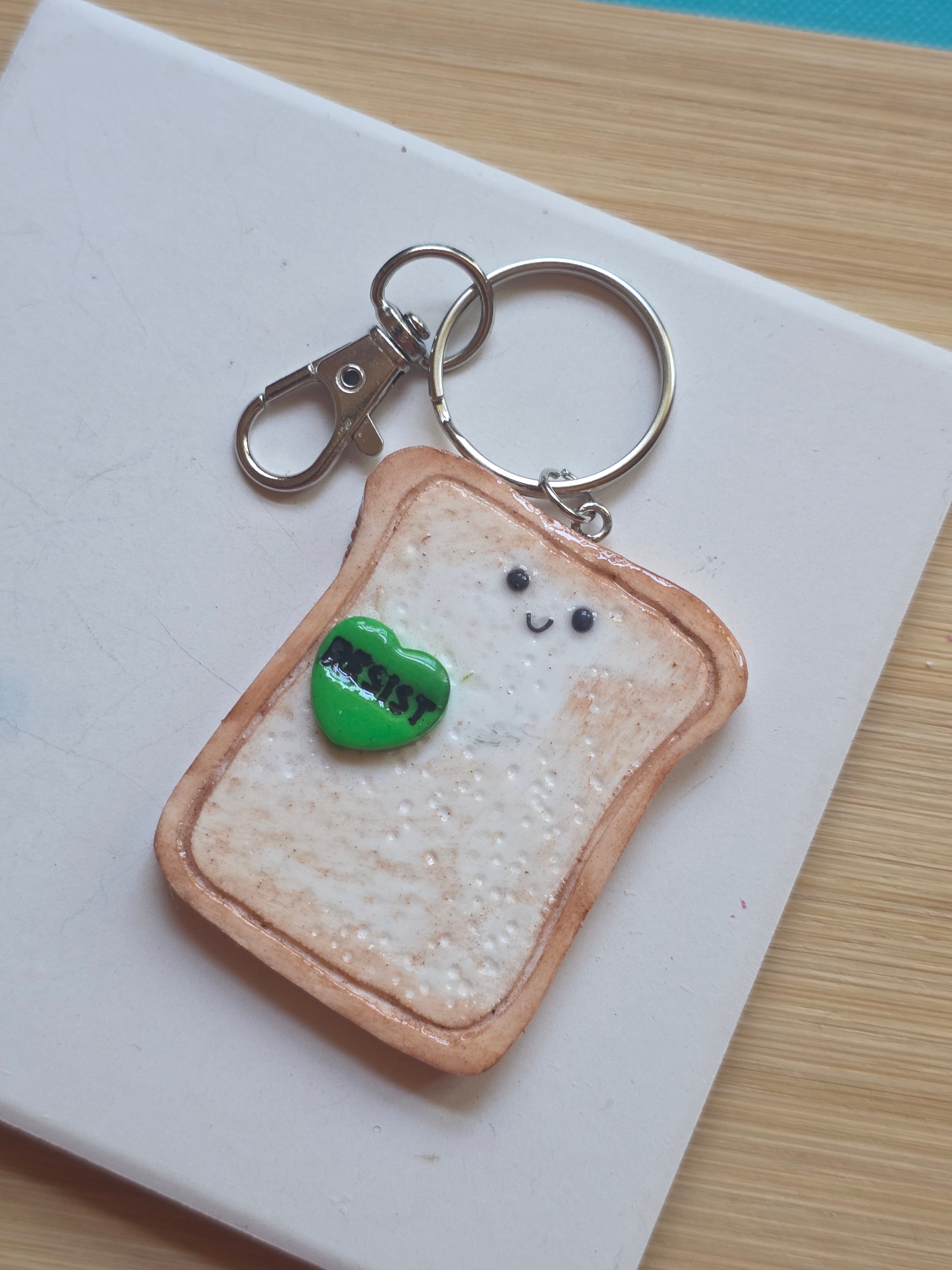 Resist! Emotional Support Toast Friend Keychain