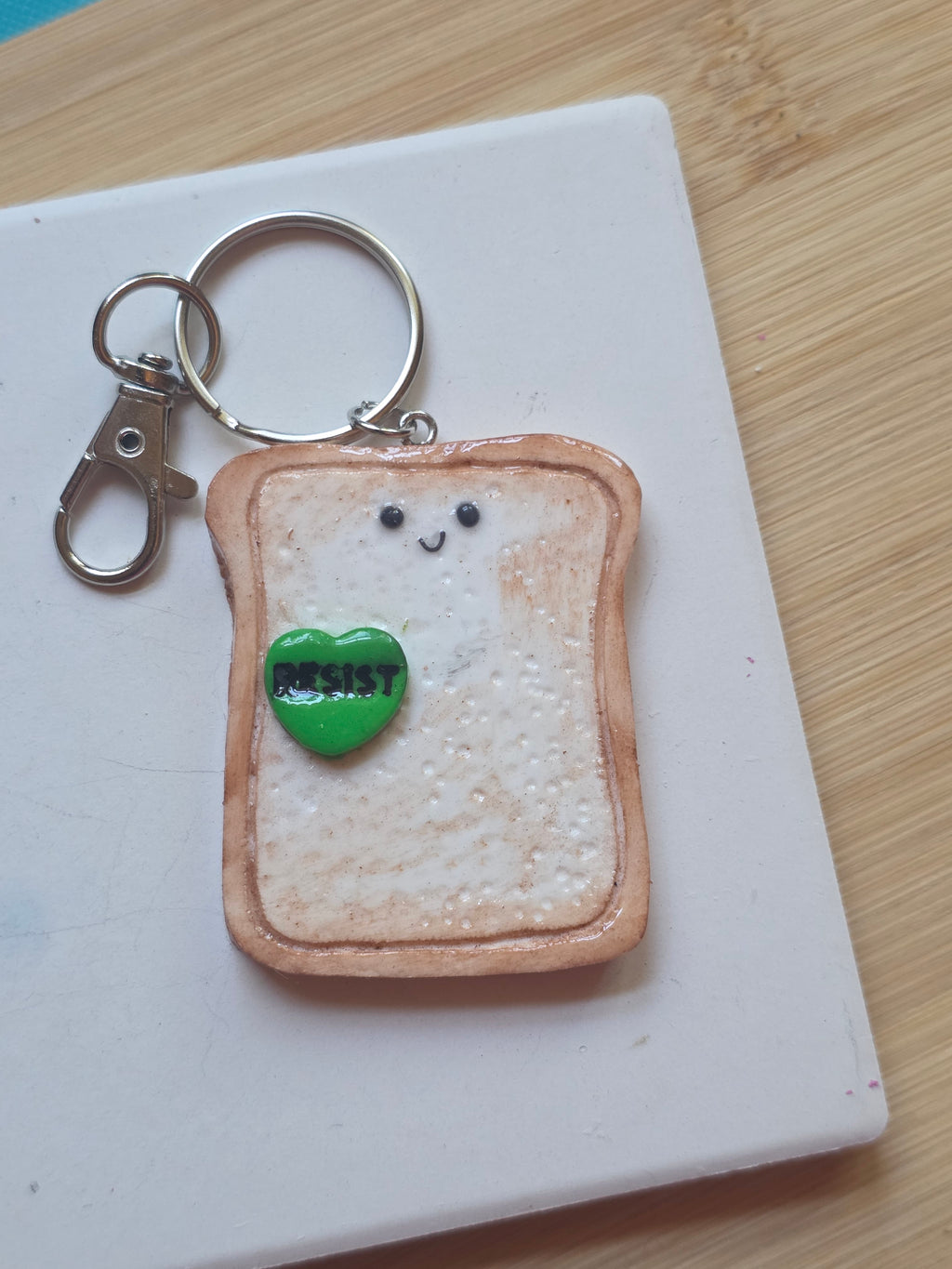 Resist! Emotional Support Toast Friend Keychain